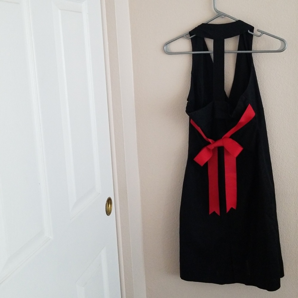 black dress with red ribbon